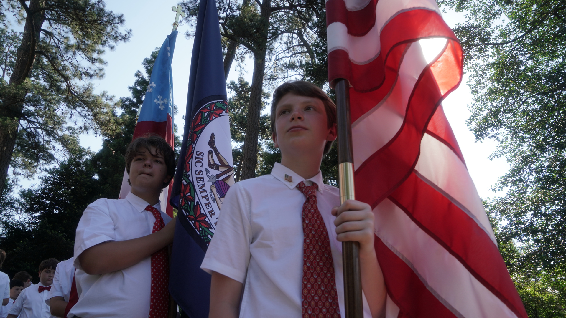 students holding flags